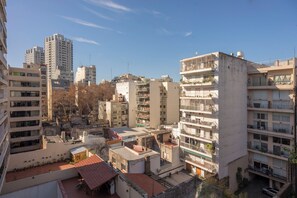 Residents enjoy apartment living in this urban neighborhood with multi-storied buildings and balconies.