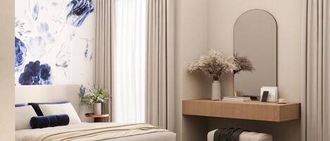 A modern bedroom with a bed, a vanity with a mirror, and a wall with a floral mural.
