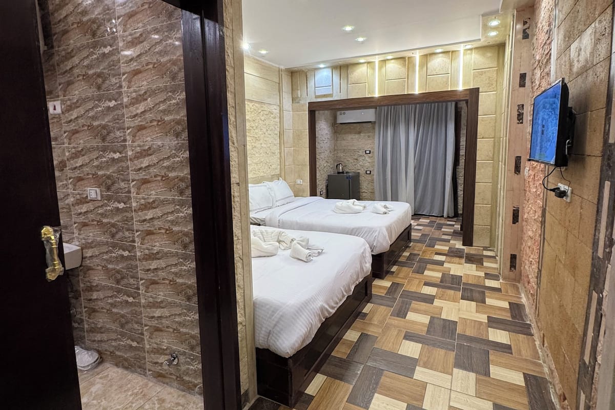 Deluxe Quadruple Room | Egyptian cotton sheets, premium bedding, down comforters, pillowtop beds