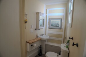 Shower, eco-friendly toiletries, hair dryer, towels
