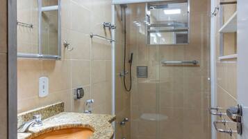 Shower, hair dryer, towels, shampoo