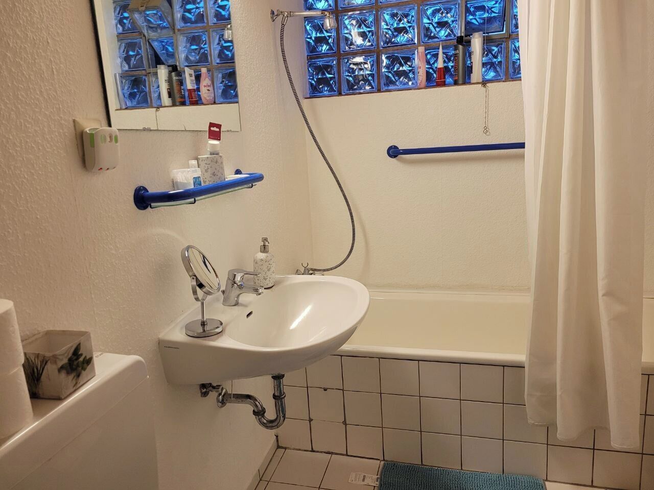 Hair dryer, towels, soap, toilet paper