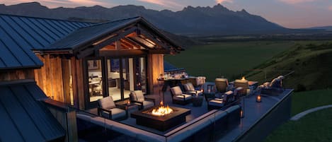 55-inch flat-screen TV with satellite channels, fireplace, iPad