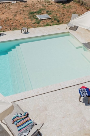 Outdoor pool, pool umbrellas, pool loungers