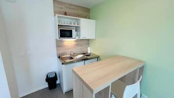 Fridge, microwave, coffee/tea maker, toaster