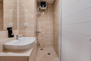 Standard Studio, 1 Bedroom (Apartment) | Bathroom - Serene Studio at Springwood Residence Tangerang Apartment (Tangerang)