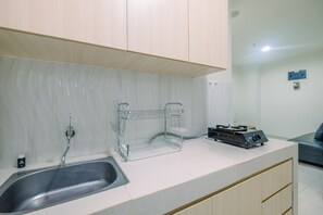 Standard Apartment, 2 Bedrooms (Apartment) | Private kitchen - Homey 2BR at Sentul Tower Apartment (Citaringgul)