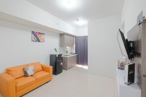 Standard Apartment, 2 Bedrooms (Apartment) | Living room - Minimalist and Well Designed 2BR Apartment with Extra Room at Vittoria Residence (Jakarta)