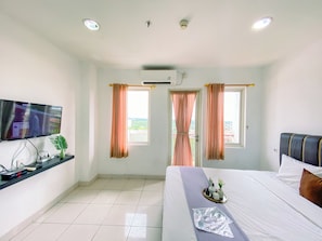 Room - Comfort Living 1BR at Sentul Tower Apartment (Citaringgul)