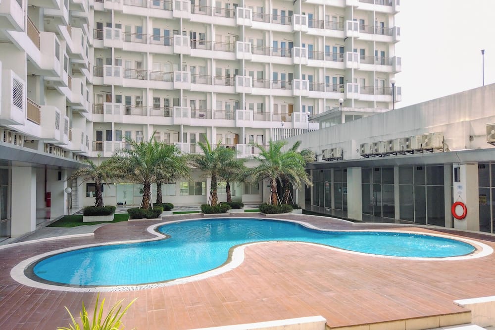 Warm and Cozy 1BR without Living Room at Sentul Tower Apartment