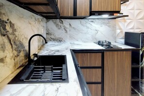 Standard Apartment, 1 Bedroom (Apartment) | Private kitchen - Cozy and Spacious 1BR at Anderson Supermall Mansion Apartment (Surabaya)