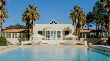 Outdoor pool, open 8:00 AM to 10:00 PM, pool umbrellas, sun loungers