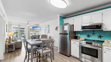 Signature Apartment, 2 Bedrooms, Beach View, Beachfront | Private kitchen | Fridge, microwave, oven, stovetop