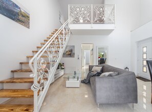 Villa (Three Bedroom House with Pool) | Living room | 32-inch flat-screen TV with satellite channels