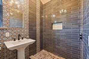 Shower, towels, toilet paper