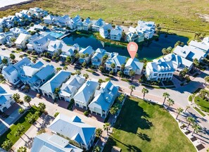 Experience the tropical ambiance of this resort, surrounded by well-maintained lawns and palm trees, with a large pool and multiple entry points.