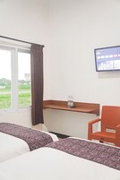 Quarto duplo, para não fumantes, vista para a cidade | Roupas de cama premium, edredons de pluma, camas com colchões pillow-top