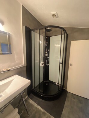 Shower, hair dryer, towels, soap