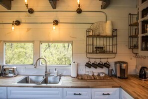 Fridge, microwave, oven, stovetop - Renovated Train Car Tiny Home Near Smoky Mountains (Maryville)