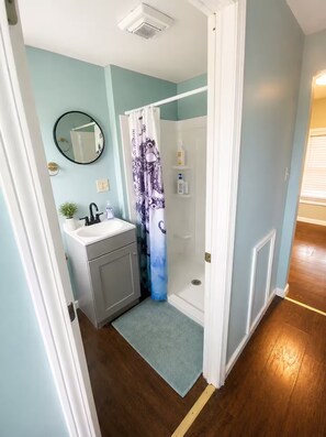 Shower, hair dryer, towels, soap