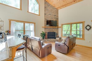 TV, fireplace, table football, books - Game Room & 3-Story Deck at Lake Hiwassee Hideaway (Murphy)