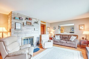 TV, fireplace, books - Private Dock, Deck & Yard: Deerskin Lake Retreat! (Eagle River)