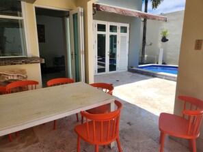 Outdoor dining - 4-bedroom house in the best area of San Juan, walking distance to the Beach. (San Juan)