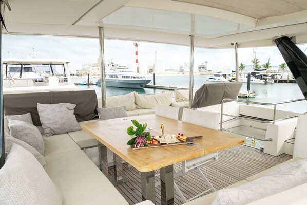 Outdoor dining - Luxurious "Atlantia" 2020 6-bedrooms 64ft yacht with full time crew (Key West)