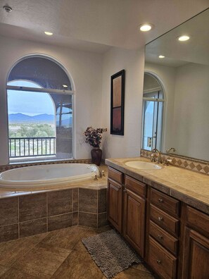 Jetted tub, hair dryer, towels, soap