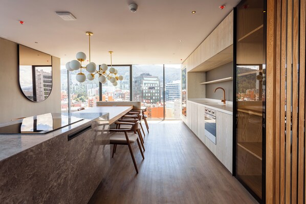 Fridge, microwave, stovetop, coffee/tea maker