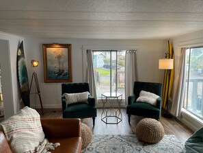 TV, fireplace, books, offices