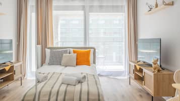Comfort Studio Suite, Balcony, City View | Individually decorated, individually furnished, iron/ironing board