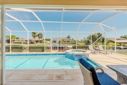 Villa Victoria - Electric-Heated Pool Home on Gulf Access Canal - SWFL Rentals