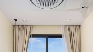 A bedroom with a large bed, a view of a pool and greenery, and a ceiling fan. - Staylar Pool Villa - Bangtao, Phuket C1 (Phuket, Bangtao)