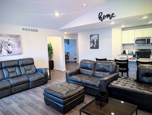 Living area - Modern Comfort. Perfect location, close to I-80 and sparkling clean! (Des Moines)