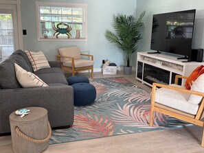 TV connectée, cheminée, jeux vidéo, table de tennis de table