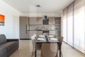 Unclassified image, 5 of 27, button - Holiday home ELEA is the 2025 novelty that will give you a holiday in Pineto but with the charm of a new modern construction, fresh and designed with all the comforts. The Calipso apartment has a large living room with kitchenette and sofa bed at the ent (Pineto)