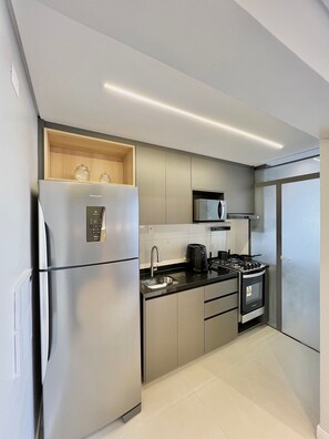 Apartamento grand | Cozinha privada | Cooktop