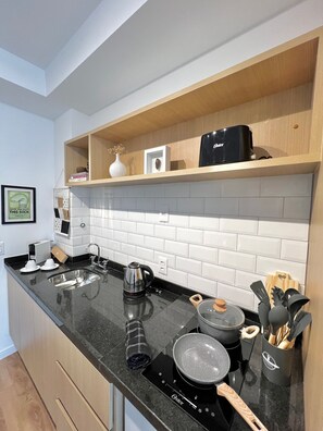 Comfort Studio | Private kitchen | Stovetop - Innvista - AirBrooklin (São Paulo)