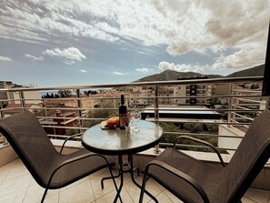 Deluxe Triple Room, Balcony, Sea View | Balcony