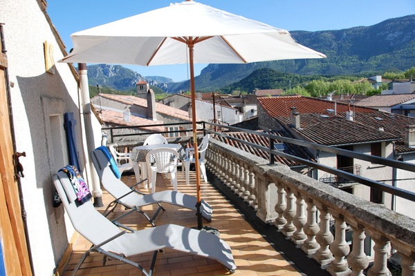 Sunny Roof Terrace on Attic level with Sunbeds, Parasols, table & chairs.