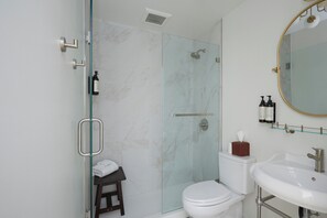 Shower, hair dryer, towels, soap