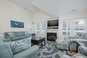 TV, fireplace, books, stereo