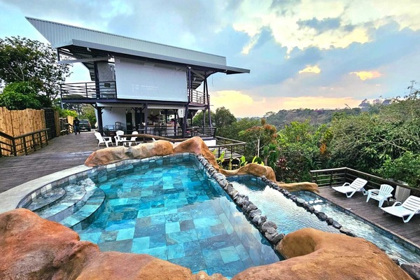 Waterfall pool by reception and bar & Restaurant