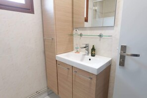 Douche, sèche-cheveux