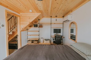 1 bedroom, desk, iron/ironing board, travel crib
