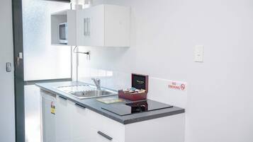 Microwave, stovetop, coffee/tea maker, toaster