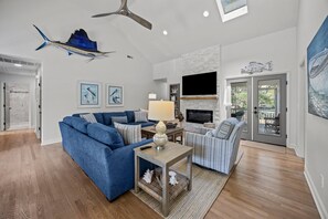 Smart TV, fireplace, books