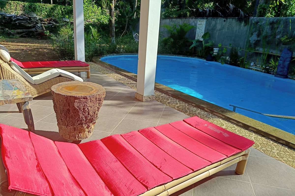 Habitación doble superior, vista al jardín | Terraza o patio