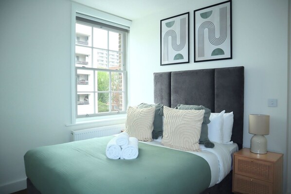 1 bedroom, desk, iron/ironing board, travel cot